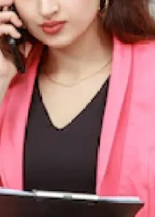 vertical-portrait-young-lady-holding-her-notebook-talking-phone_144627-76720